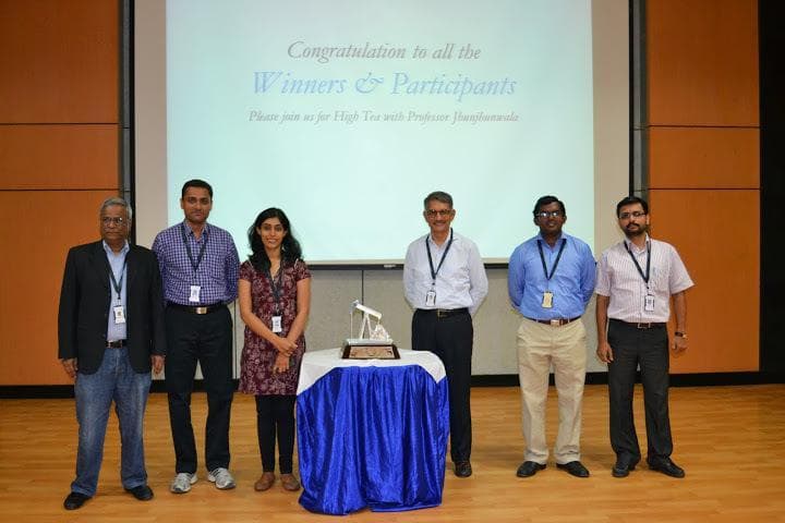 Karthik Parthasarathy receiving the JET award with the Sasken team